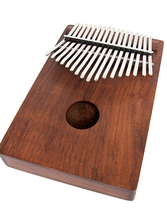 To play, rest the rosewood thumb piano on the fingers of both hands and hold it between your palms
